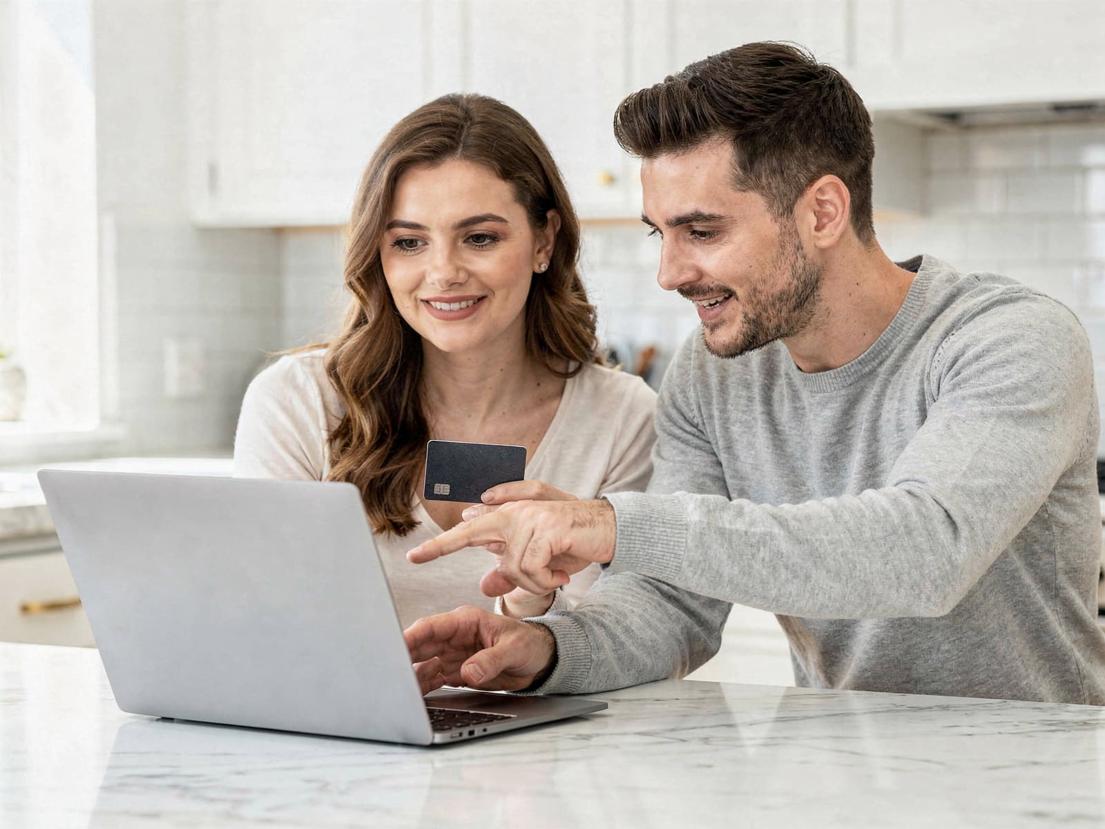 A couple paying their event deposit online